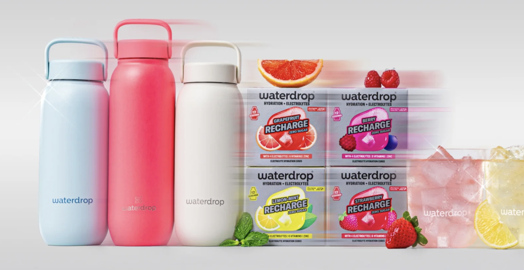Boîtes Waterdrop Recharge Hydration + Electrolytes en quatre saveurs — pamplemousse, berry, citron-menthe, fraise — avec gourdes isothermes